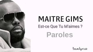 MAITRE GIMS  Estce Que Tu Maime parolesaudio [upl. by Otrebla]